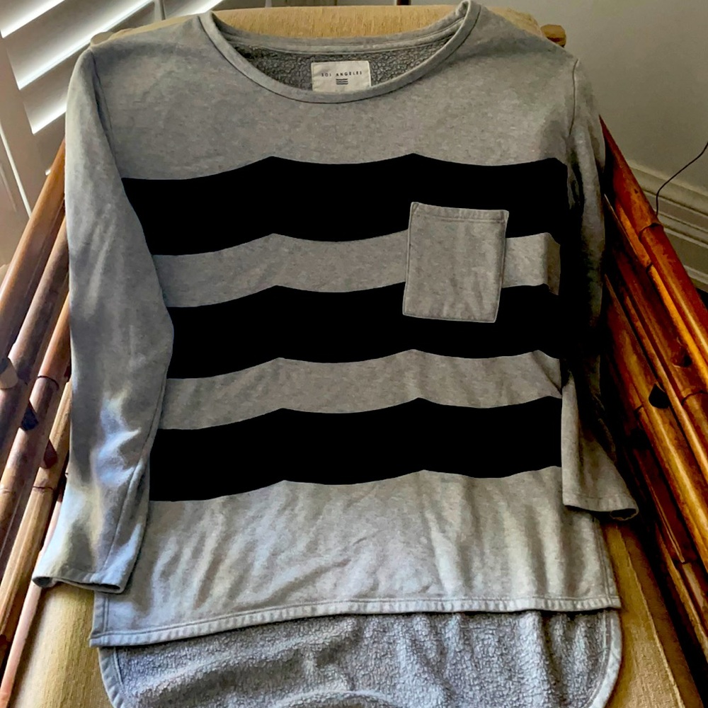 Grey and black striped long sleeve top.